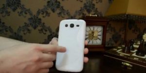 holding phone backwards