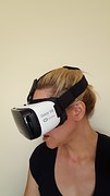 woman wearing virtual reality console