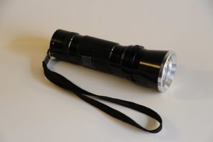 black tactical flashlight